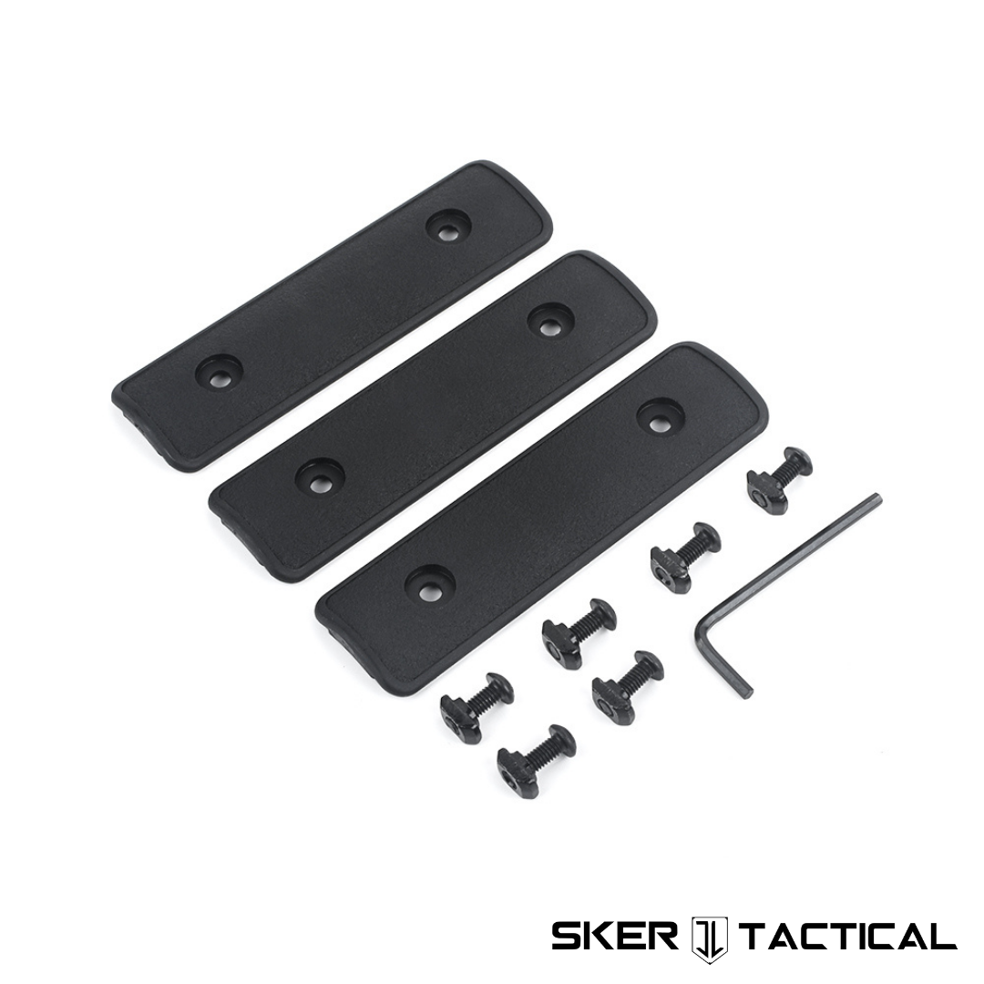 Black Flat M-LOK Cover Kit disassembled with all parts and included hardware displayed